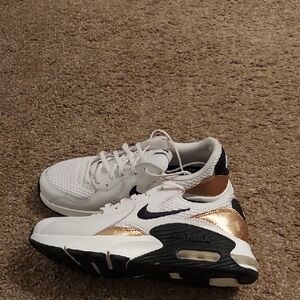 Nike Sneakers in White and Gold with Chunky Design and Thick Sole